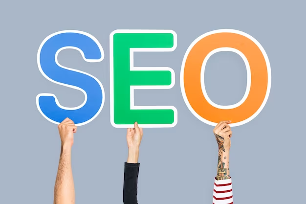 Hands holding the letters of the word SEO